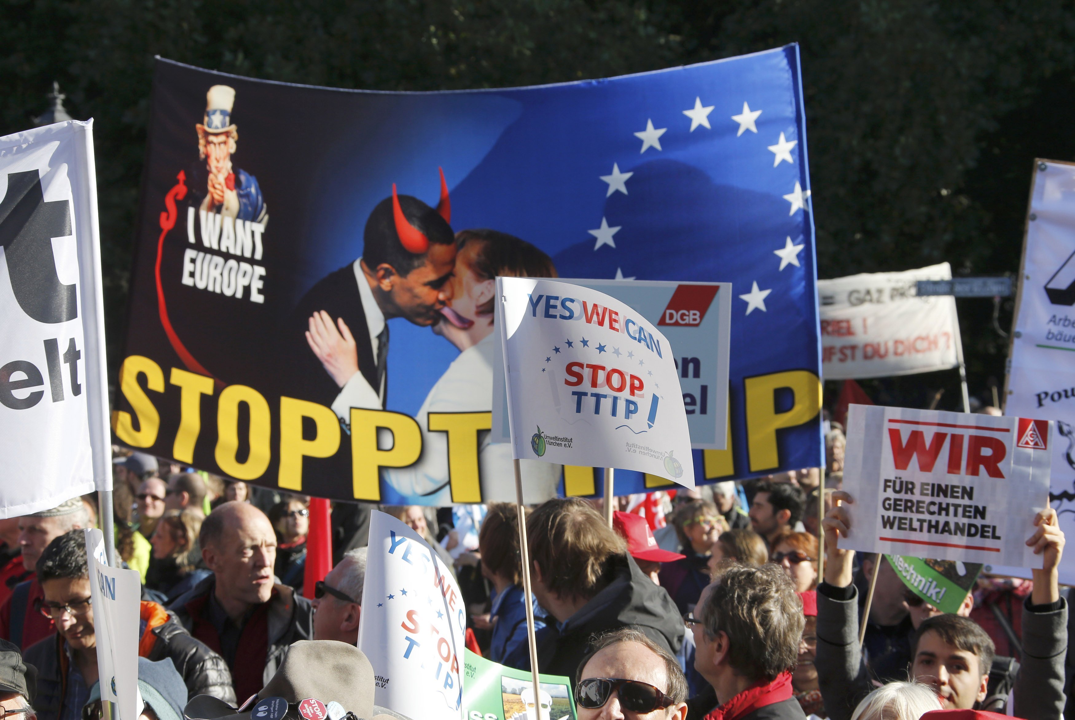 Consumer rights activists take part in a march to protest against the Transatlantic Trade and Investment Partnership (TTIP), mass husbandry and genetic engineering, in Berlin, Germany, October 10, 2015 Consumer rights activists take part in a march to protest against the Transatlantic Trade and Investment Partnership (TTIP), mass husbandry and genetic engineering, in Berlin, Germany, October 10, 2015