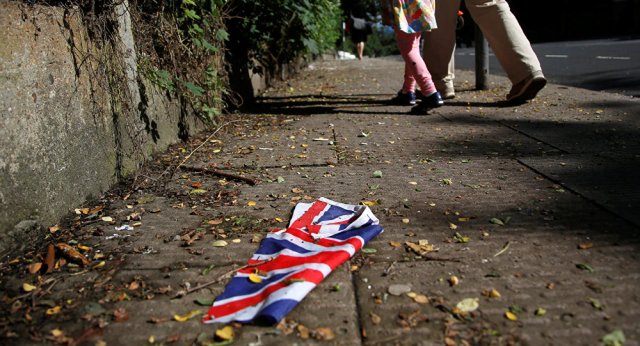 A British flag which was washed away by heavy rains the day before lies on the street in London, Britain, June 24, 2016 after Britain voted to leave the European Union in the EU BREXIT referendum. A British flag which was washed away by heavy rains the day before lies on the street in London, Britain, June 24, 2016 after Britain voted to leave the European Union in the EU BREXIT referendum.
